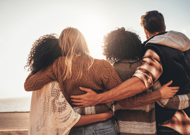 A group of people hugging